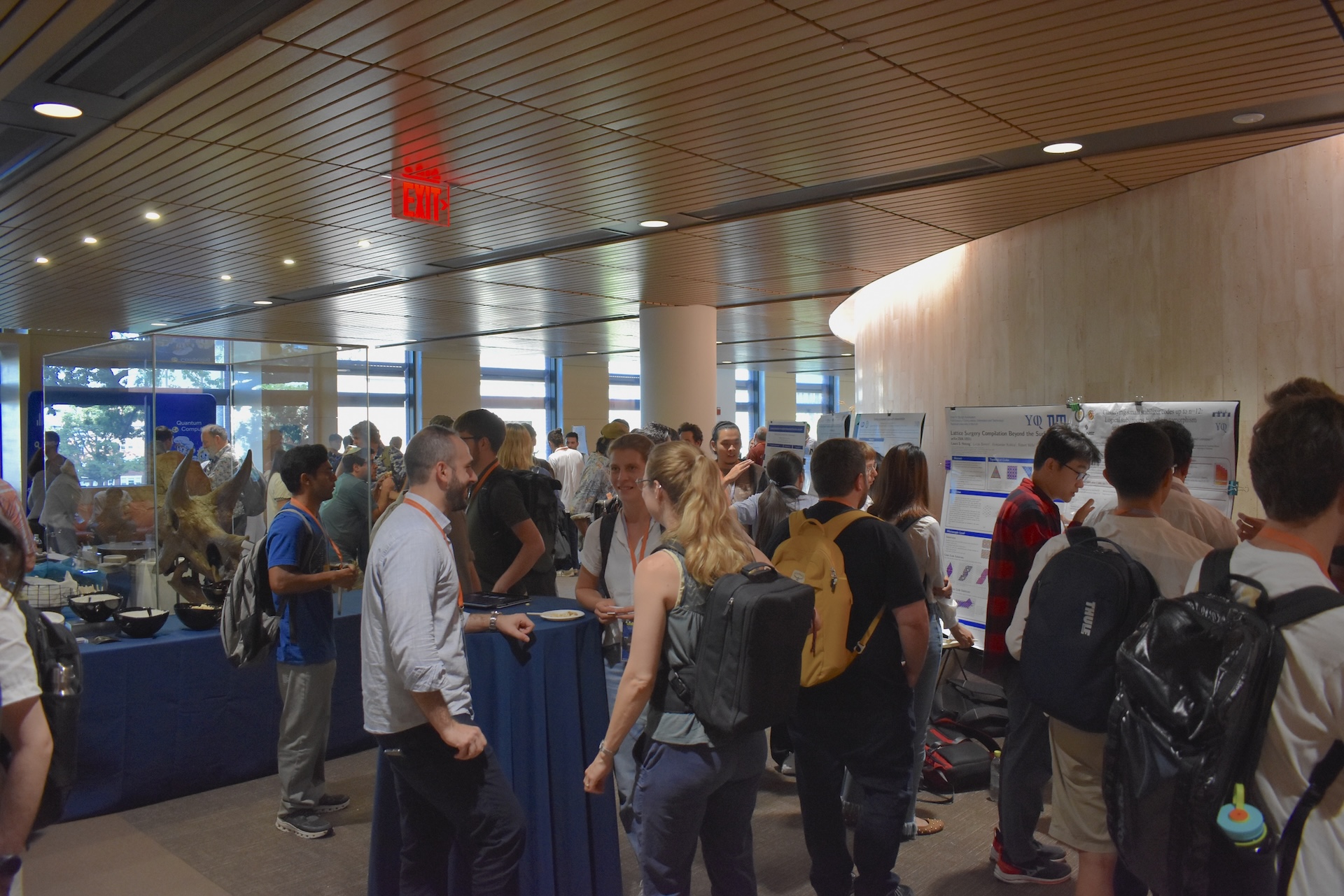 Attendees chatting around fosils